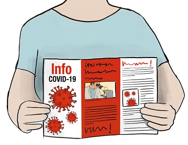 Abgebildet ist ein Mensch, der ein Fachblatt hält